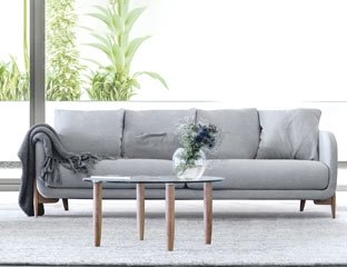 5 Seater Corner Sofa Designed By Adventures In Furniture. These Handmade Sofas Have Endless Fabric Choices To Fit Every Space In Your Home. This Sofa On Show Has Wooden Legs With A Matching Coffee Table
