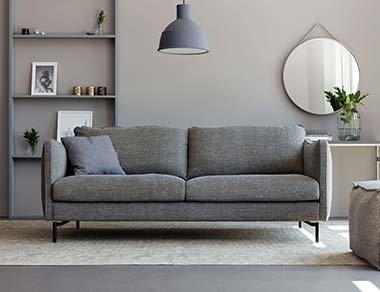 Grey 3 Seater Sofa designed By Adventures In Furniture. This 3 Seater Fabric Sofa Has Endless Fabric Choices To Fit Every Space In Your Home. This modern grey sofa looks great on any flooring