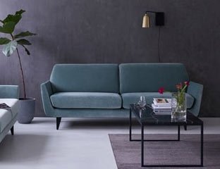 Modern 3 seater sofa designed By Adventures In Furniture. This Bespoke Sofa Has Endless Fabric Choices To Fit Every Space In Your Home