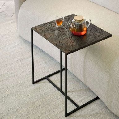 Lava coffee table is the table underneath, without the linear pattern