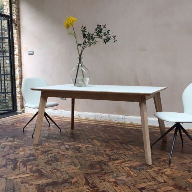 solid extending dining table in an oak finish a modern dining table 