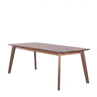 modern walnut extendable dining table with breakfast being served